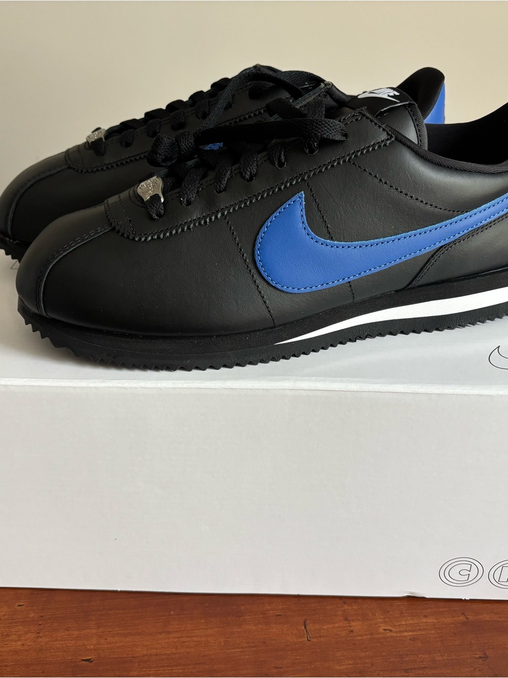 Nike Cortez Men’s Black Sneakers with Blue Swoosh